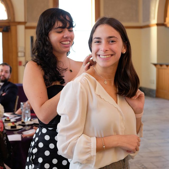 McDorman Scholars putting on their custom Honors necklaces