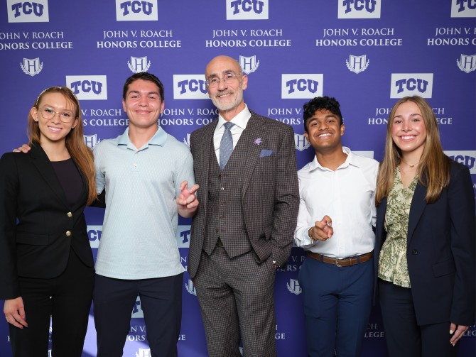 Arthur C. Brooks with students at Q&A event