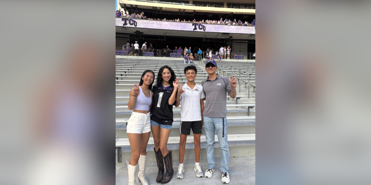 Liberty Trevino with family members at Amon G. Carter stadium