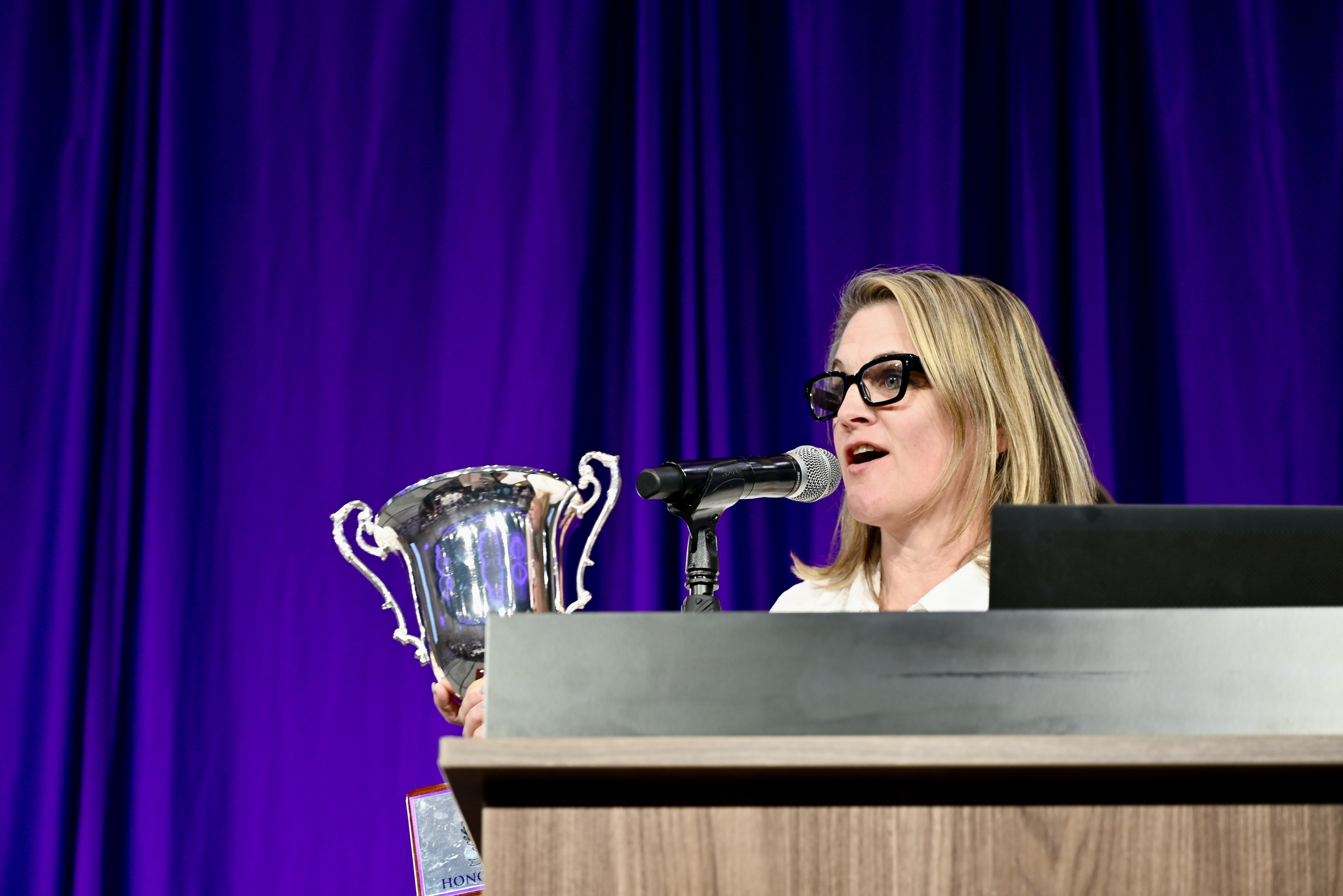 Professor Stacy Landreth Grau accepting Professor of the Year award