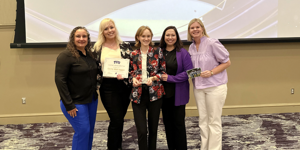 Justine Grace with fellow advisors and Assistant Dean Marie Martinez