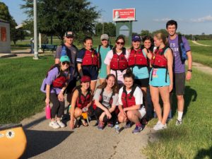 Students in Williams' Fall 2018 Treks & Texts course pose for a photo before canoeing on the Trinity River