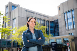 Courtney Sullivan stands in front of The University of Chicago Hospital
