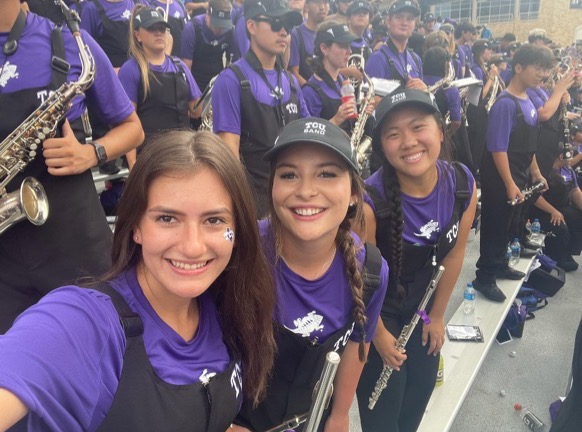 Leah in the stands with her flute