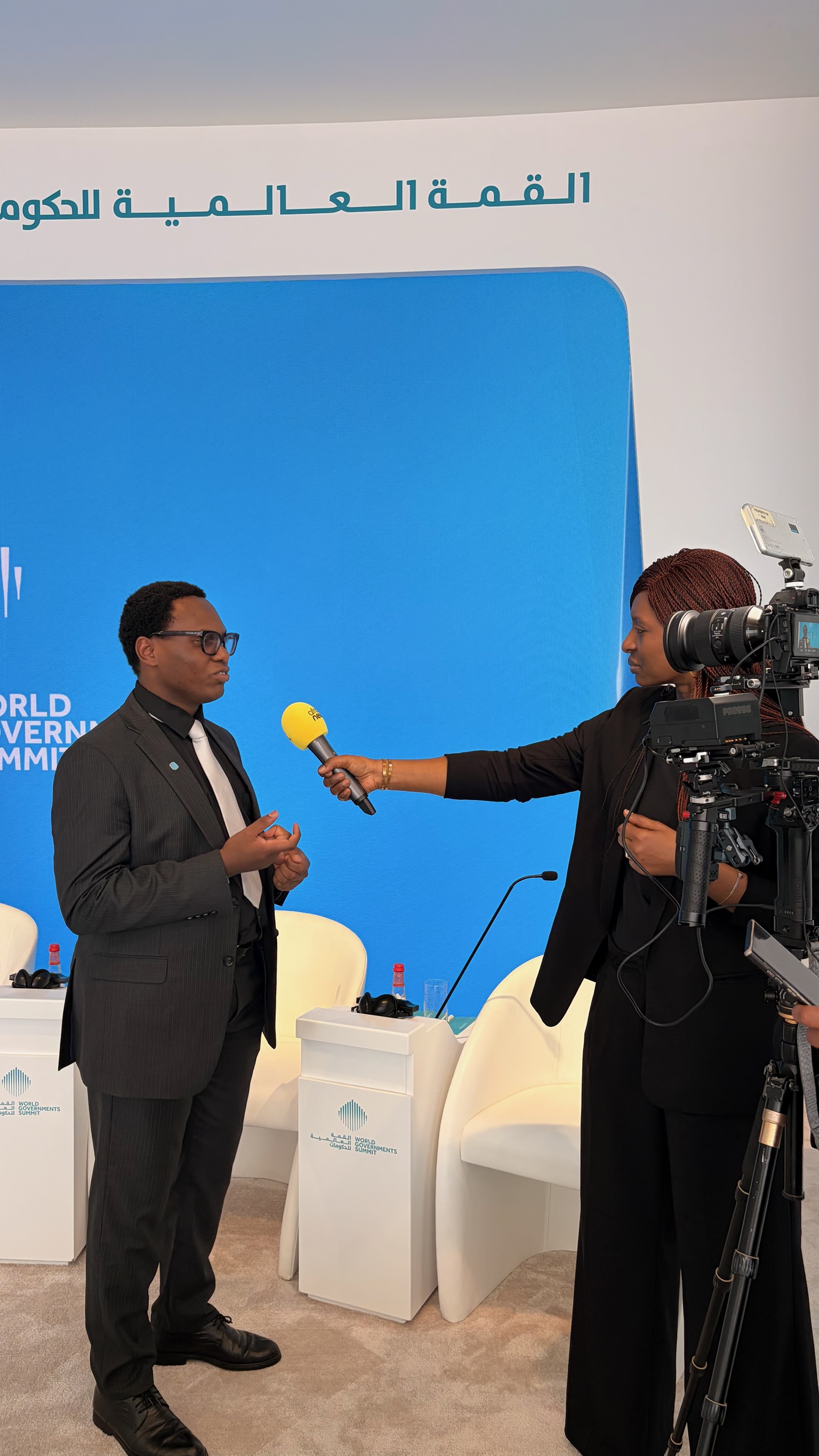 Happy speaking to the press